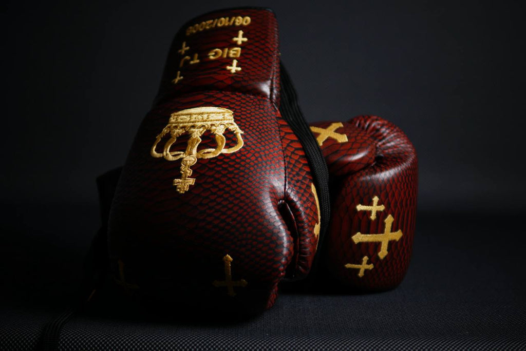 Custom burgundy and gold boxing gloves with cross embroidery