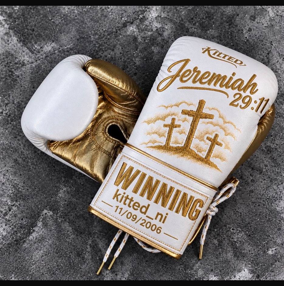 Custom white and gold boxing gloves with Jeremiah 29:11 embroidery